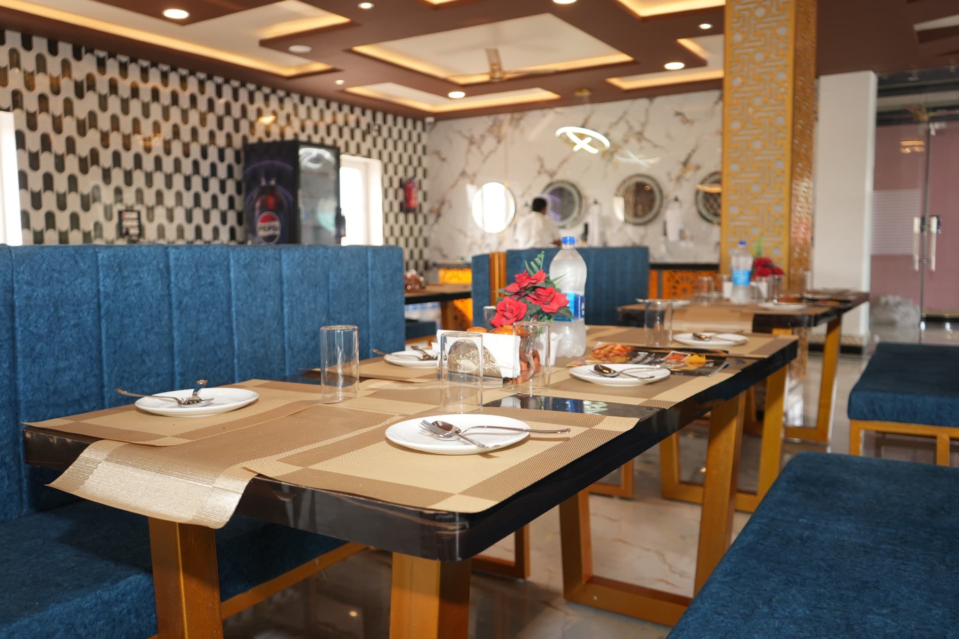 Restaurant dining area at Ansh Hotel & Resort